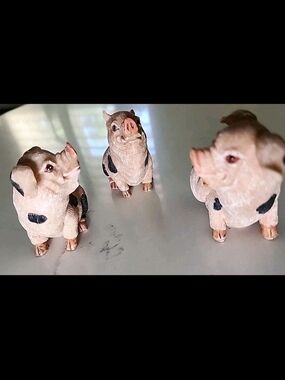 Three-Piece Pink and Black Pig Figurine Collectable Set Of 3